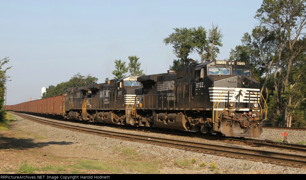 NS 9722 leads a long train 920-24 out of the yard